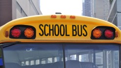 Three Injured in School Bus, Squad Car Crash
