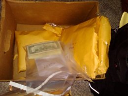 Mobster's Guns, Cash and Tapes Discovered