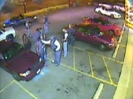Sergeant Charged After Slapping Cuffed Man