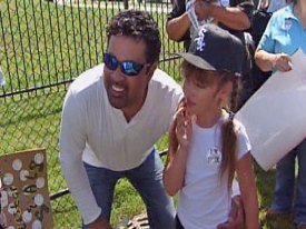 Sox Skipper Guillen Has a Softer Side: Children