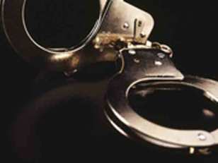 Businessman Charged With Bribing "City Agent"