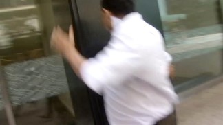 Photographers Chase Fundraiser Outside Court