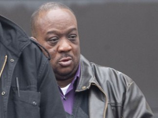 Sergeant Charged After Slapping Cuffed Man