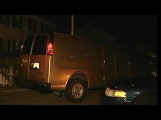Kennedy's Body Leaves Compound in Gold Van