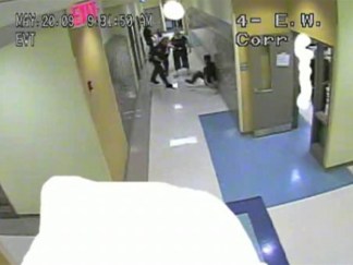 Surveillance Video Captures Struggle Between Cop, Student