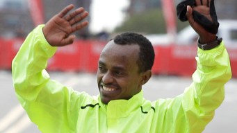 Tsegaye Kebede Crosses the Finish Line