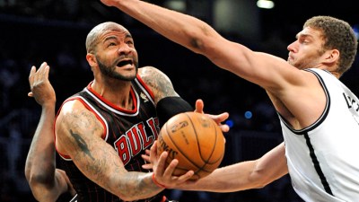 Robinson, Deng Lead Bulls Over Magic