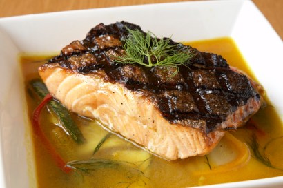 Veerasway's salmon with cucumber and tumeric-dill broth is grilled and served with sauteed napa cabbage. Veerasway's salmon with cucumber and tumeric-dill broth is grilled and served with sauteed napa cabbage.