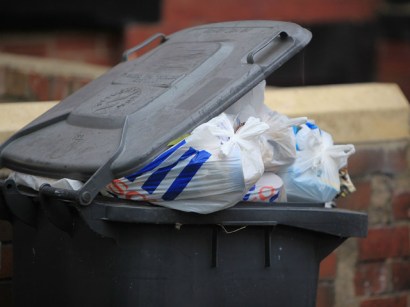 An overflowing garbage can