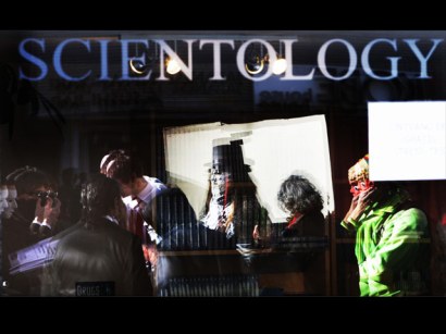 Protesters gather outside a Church of Scientology building.