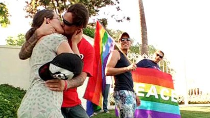 Kiss Off: Activists Pucker Up for Protest