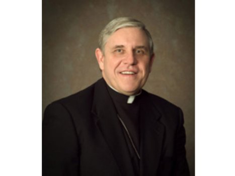 Milwaukee Archbishop, a Chicago Native, Bets Against Bears