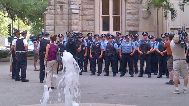 Police Hold Roll Call on Mag Mile