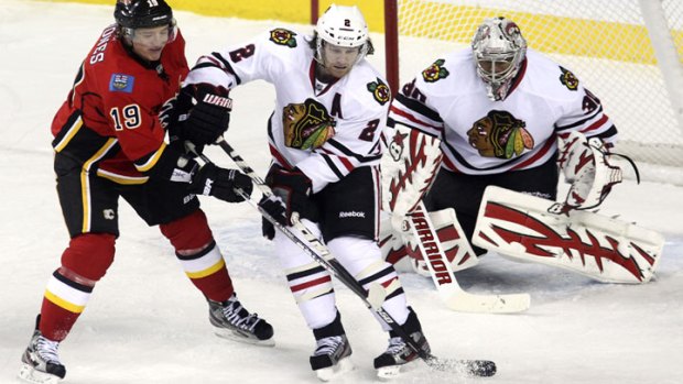 Flames Beat Blackhawks