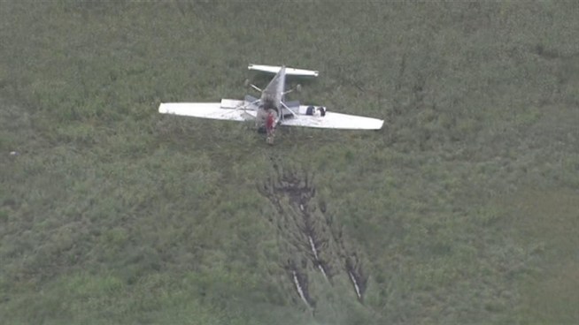 Four people survive a small plane crash near Midway Airport.