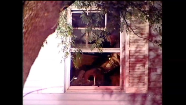 Firefighters rescue two elderly people from early morning house fire.