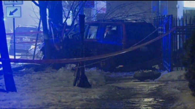 Two men were shot while sitting in a car at a red light in Rogers park this morning.