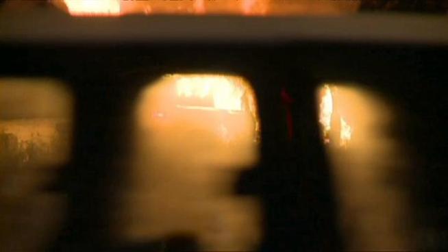 Chicago police continue to investigate a burning SUV at 67th and Lowe overnight.