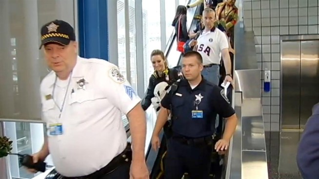 After filing through London's Heathrow Airport soon after the closing ceremonies, local athletes arrived home the following morning via O'Hare International Airport to applause and attention. Rob Elgas reports.