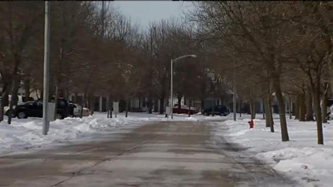 Two men in a white van with no side windows reportedly approached a 13-year-old girl while she was walking to her bus stop on Teton Parkway around 9:30 a.m. Tuesday.