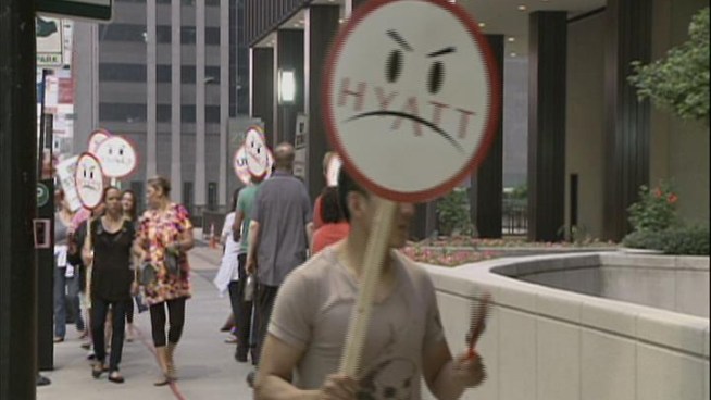 Hotel workers demand the Hyatt Regency Chicago give them a better contract.
