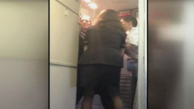 An American Airlines flight attendant Friday morning had to be restrained after ranting over the PA system on a Dallas-Fort Worth flight to Chicago. Passengers said the flight had just pushed back from the gate at Dallas-Fort Worth Airport when a senior flight attendant began ranting on the intercom that the airplane was unsafe, and that they were in danger of crashing if the pilot proceeded with the takeoff.