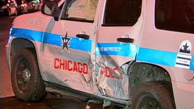 Two Chicago police officers are OK after a drunk driver sideswiped their squad car, according police.