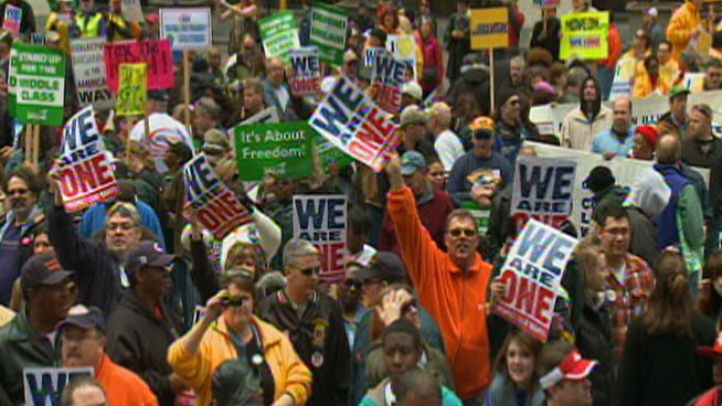 As many as 15,000 people were estimated to have converged on Chicago's Daley Plaza on Saturday in rallies in support of unions and public employees.