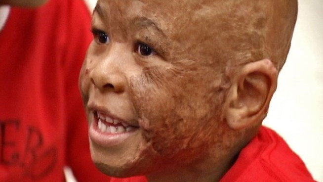 Dereonte Ashford, 6, was rescued from his basement <A HREF=