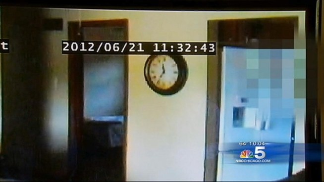 A security camera in a home in Portage, currently for sale, captures a real estate agent searching through a kitchen cabinet. The agent, not associated with the listing agency for the home, is currently under investigation. Dick Johnson reports.