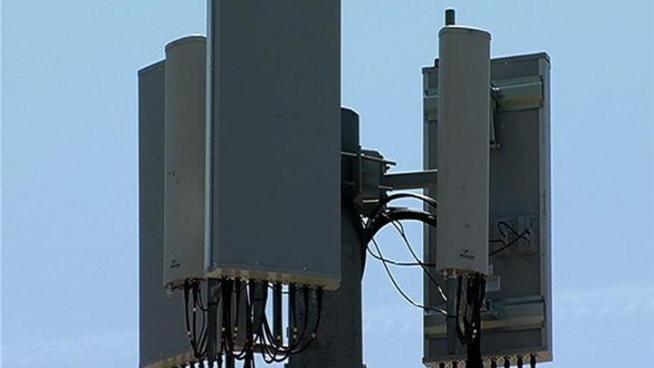 AT&T and Verizon Wireless setup portable cell site to deal with the increased cellular traffic that protestors will bring.