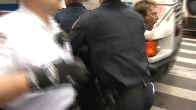 More than 180 people were arrested in lower Manhattan Monday as hundreds gathered, chanting, marching, making music and beating drums, to mark the one-year anniversary of the Occupy Wall Street movement near its birthplace. That didn't stop protesters from gathering again Monday night. Gus Rosendale has more.