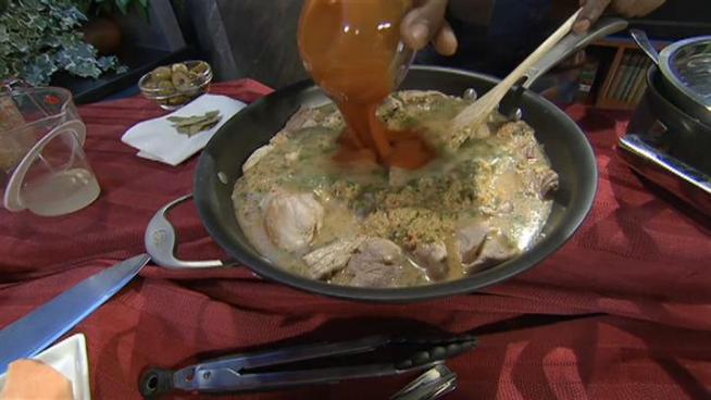 Wayne makes one of Zoraida's favorite dishes: arroz con pollo