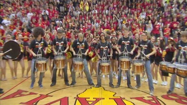 Batavia High School gathers for an early morning tailgate inside their school gym.