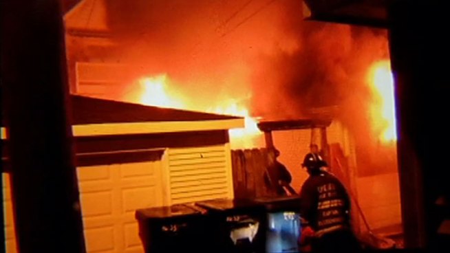 Garage fire near Farragut and Ashland avenues quickly spread to neighboring structures, leaving behind charred frames and crumpled doors. Anthony Ponce reports.