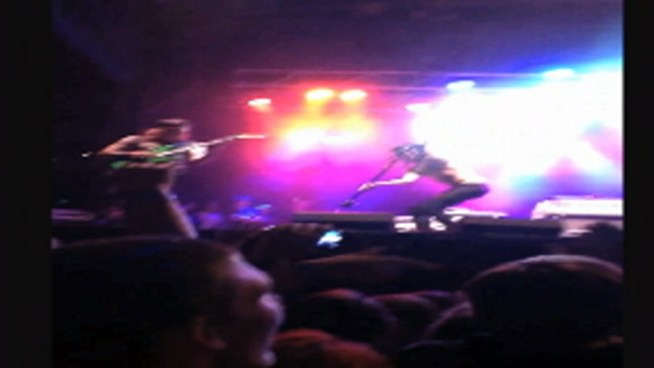 Two people were injured during a concert at Six Flags Great Adventure this past weekend. Police say the lead singer of the band Falling in Reverse threw three microphone stands off the stage and hit two people in the head. NBC10's Cydney Long reports.