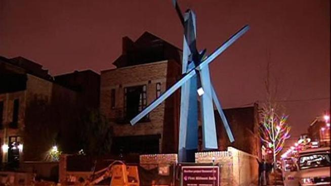 A huge, blue scupture recently installed on Burling Street in Linoln Park has drawn the ire of some neighbors who say they weren't consulted and fear the massive structure is a safety hazard.