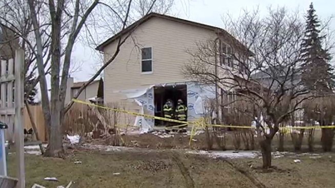 Neighbor said it appears female driver suffered a medical emergency before crashing into suburban family's living room. Lauren Jiggetts reports.