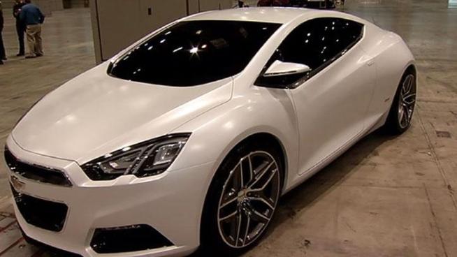 Cadillac, Chevrolet and Kia have not-yet-on-the-market cars on display at the 2012 Chicago Auto Show.