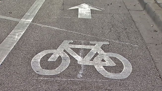 Protected bike lanes are intended to make travel safer for bicyclists, but many drivers say they find the new road configurations confusing and congested. Charlie Wojciechowski reports.