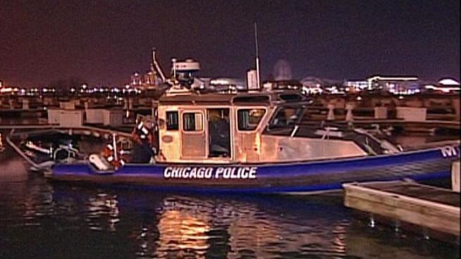 Chicago police Marine Unit officers who'd just completed a training drill on Friday night were called to action after two people -- one of them in a wheelchair -- fell into Lake Michigan at DuSable Harbor.