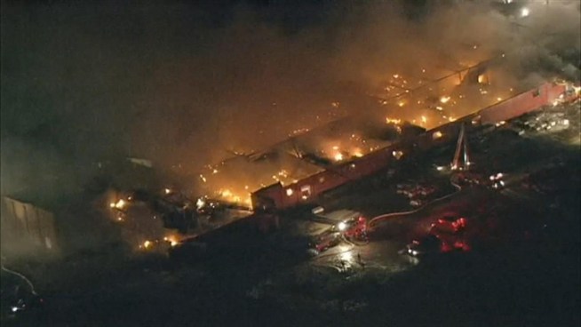A massive fire spread through a warehouse Thursday in Coal City, just south of Joliet. The blaze started around midnight.