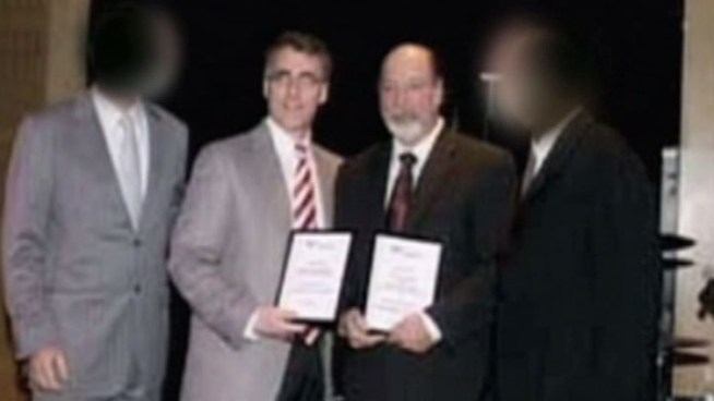 Officer Lawrence A. Draus, a 35-year veteran and high-profile member of the force, and his son, Larry Draus Jr., who goes by his middle name, Eric, were arrested earlier this week. Feds say the pair were collecting protection money out of an informant posing as a trafficker of illegal cigarettes.