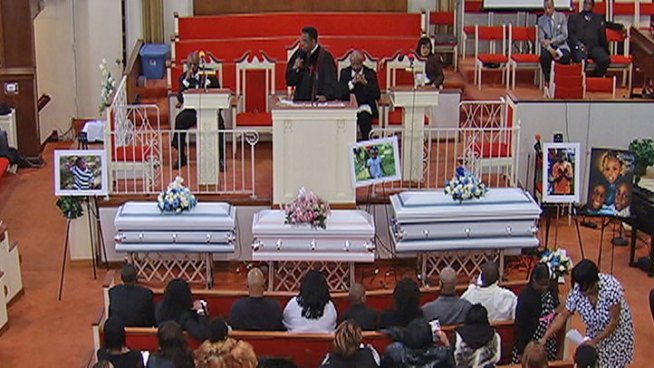 Mourners gathered Saturday for three children killed in an early morning house fire last week put faith in God's plan.
