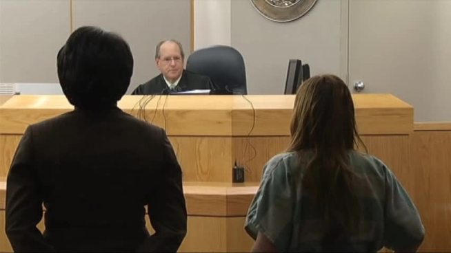 A Dallas woman who beat her 2-year-old daughter and glued the toddler's hands to a wall was sentenced Friday to 99 years in prison.