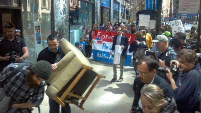 Chicago Anti-Eviction, joined by Occupy Chicago, met Wednesday morning at Jackson and LaSalle and marched to Citibank and then to Daley Plaza, where they petitioned Cook County Sheriff Tom Dart to enact a moratorium on for-profit foreclosures.