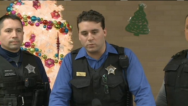 Six Chicago officers rushed into a smoking building Monday night to rescue four residents, including a 5-year-old girl.