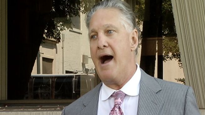 Cincinnati restaurateur Jeff Ruby talks to media after he was tossed from a Will County courtroom for mouthing a two-word expletive to Drew Peterson.