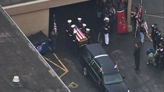 With a Patriot Guard procession and the salutes of fellow Marines, the body of Cpl. Alex Martinez made its way back to Elgin on Friday. Sharon Wright reports.