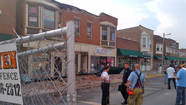 Weather is believed to have caused a parapet to crumble and  drop bricks onto passersby below. Lauren Jiggetts reports.